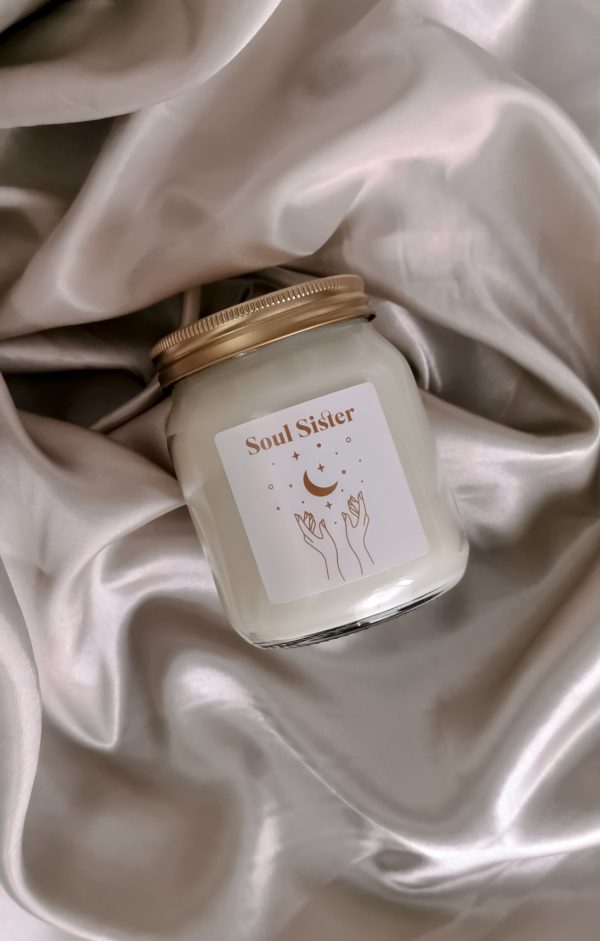 scented candle on a silk background